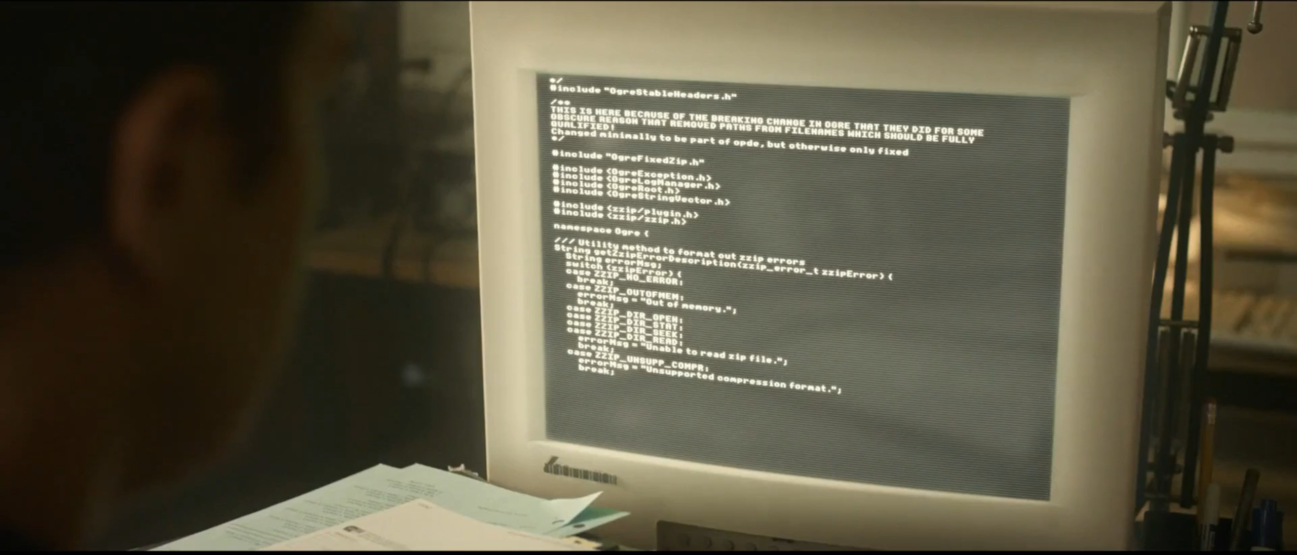 In a scene not intended to be paused on, the Amazon team watches in suspense as their lead dev pushes the beta site to prod by typing out code from a random Github repo.